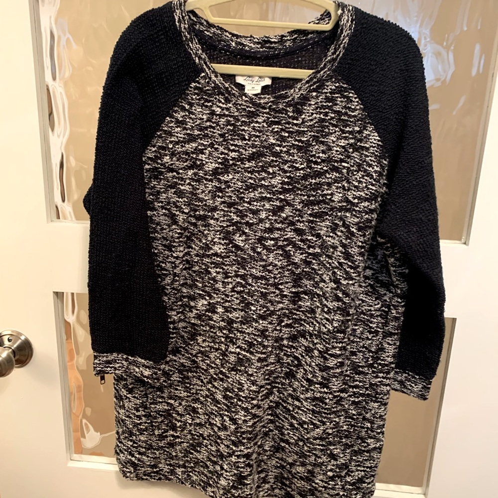 Lucky Lotus navy and white knit top.